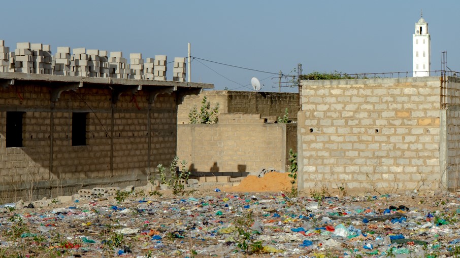The photo shows plastic waste in Senegal.